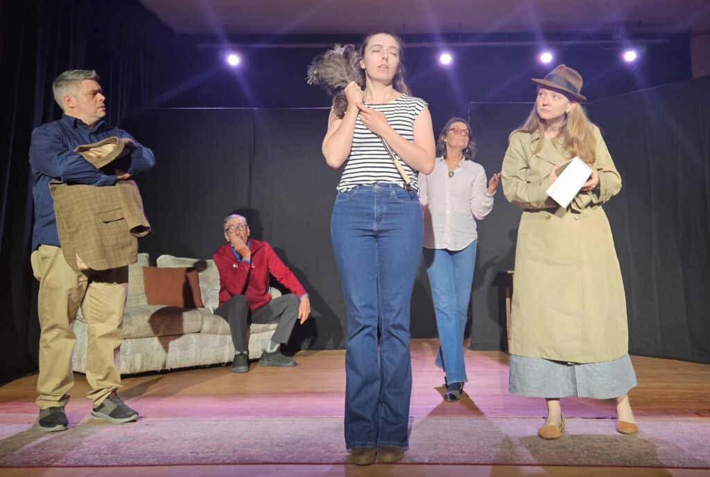 (Left to right) Randy Lichtenwalner plays Thorton Jackson, Tom Ely plays Mark Trumball, Nicole Winot plays Taylor Franklin, and Dyana Lee plays Keira Gimbal - together they make up the hapless theatre troupe whose performance is interrupted by Detective Drake, played by Catherine Terrell.